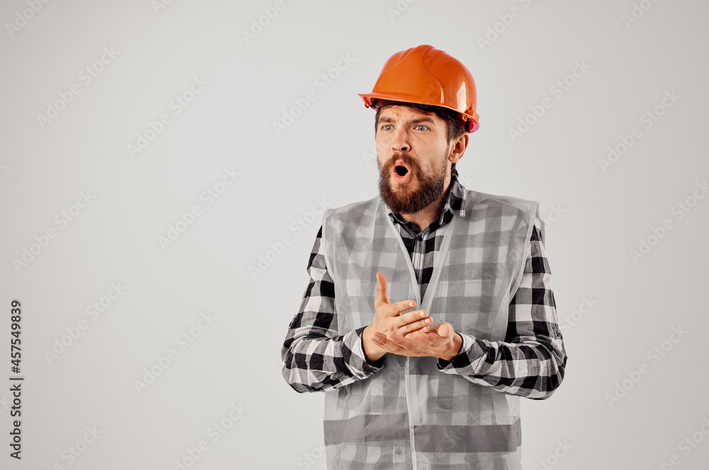 male worker with documents and drawings blueprints light background male worker with documents and drawings blueprints light background