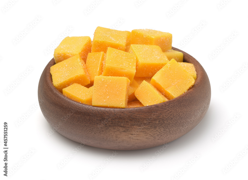 Wooden bowl of candied mango dice Wooden bowl of candied mango dice