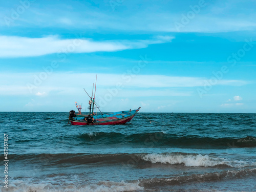 Fishing boats along the coast in Thailand in the evening