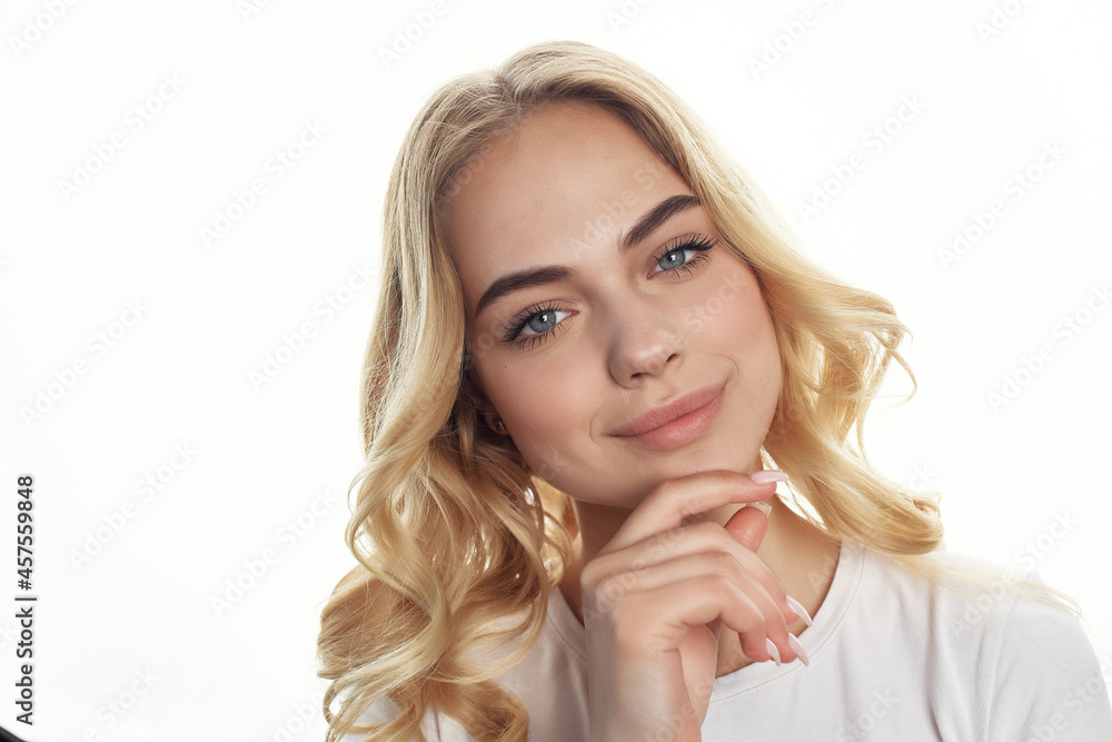 pretty blonde holding hair cosmetics face close-up pretty blonde holding hair cosmetics face close-up