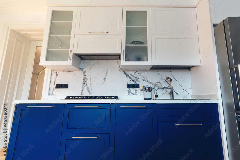 Modern new kitchen with sink, worktop and simple cupboards. Modern new kitchen with sink, worktop and simple cupboards.