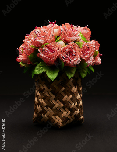 pink roses in a basket
