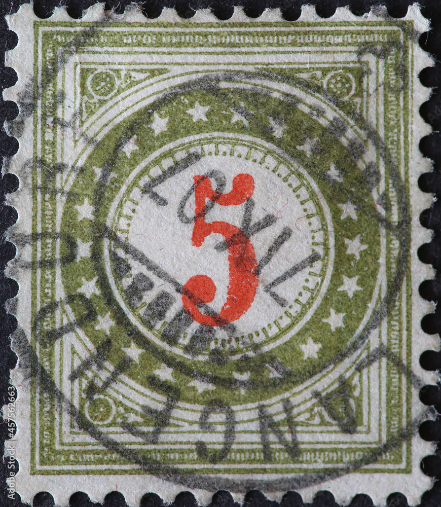 Switzerland - Circa 1878: a postage stamp printed in the Switzerland showing a circle with stars and a number in the middle. Postage only for non-profit institutions. No 5 value