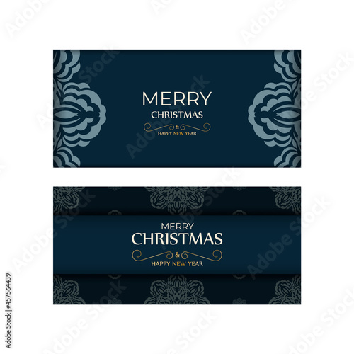 Holiday card Merry Christmas and Happy New Year in dark blue with winter blue ornament