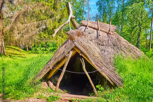The ancient Slavic pit-house with thatched roof, Pereiaslav Scansen, Ukraine photo