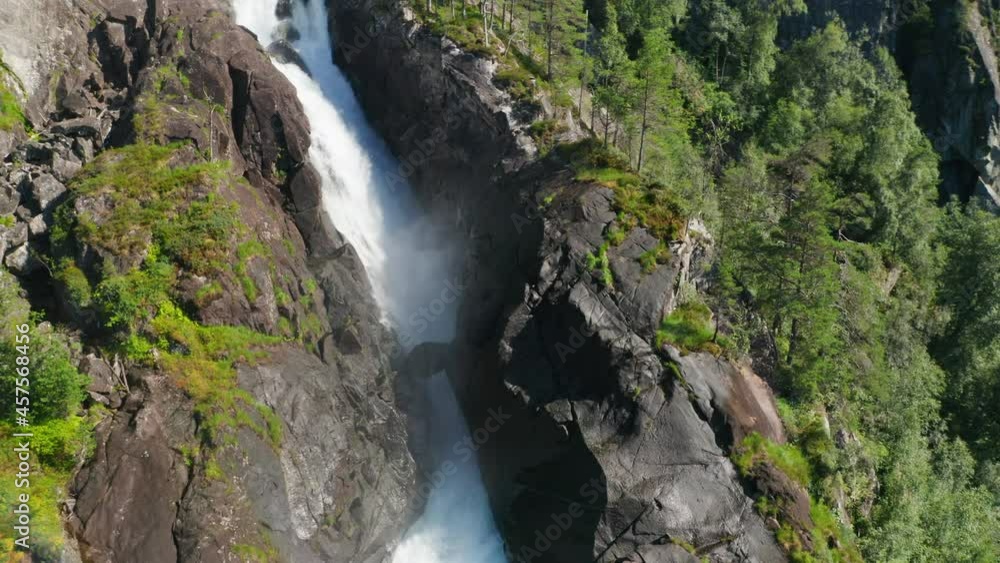Drone Over Cascading Waterfall Through Rocks With Rainbow Drone Over Cascading Waterfall Through Rocks With Rainbow