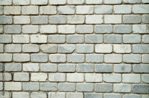 New light decorative marble bricks on wall close