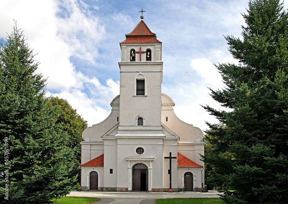 General view and architectural details of the Catholic Church of Our Lady of the Rosary in Iłowo Osada na warmi in Poland.