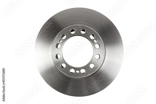 The front brake disc of a passenger car’s top view is isolated on white background. A spare part for a passenger car. Part of the braking system of a vehicle. The main element of the disc brake system