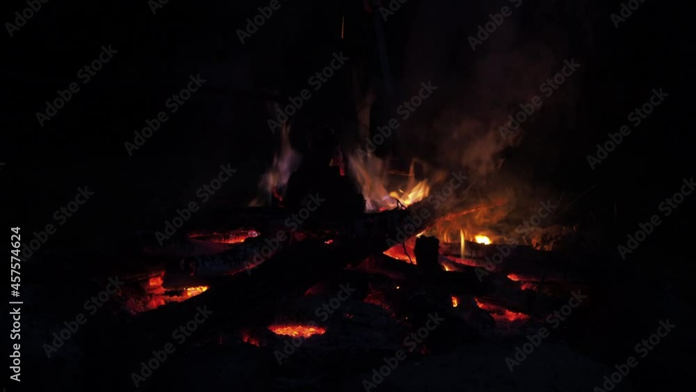 the company is frying sausages on the fire. hiking romance the company is frying sausages on the fire. hiking romance