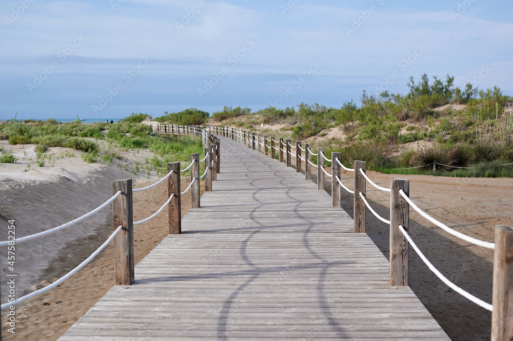 wooden bridge to the beach wooden bridge to the beach