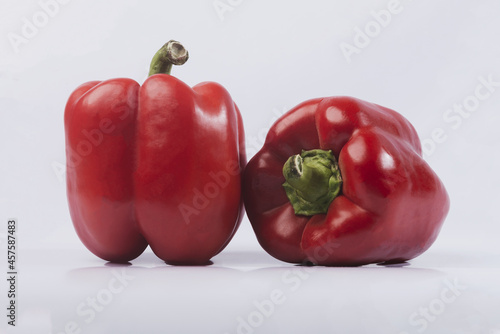Large red bell pepper on a white isolated background. Bell pepper. 