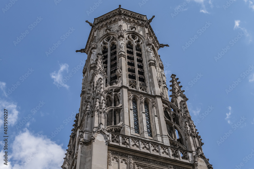 Fototapeta premium Church Saint-Germain-l'Auxerrois, Place du Louvre, Paris. Founded in 7th century, church was rebuilt many times and now has construction in Roman, Gothic and Renaissance styles. Paris, France.