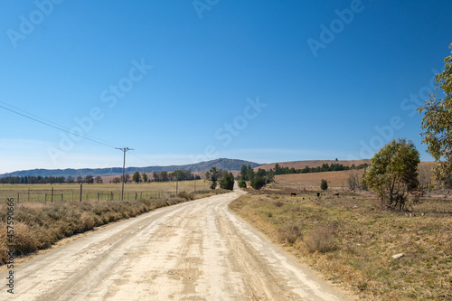 Dirt road among the mountains in rural farmlands in South Africa