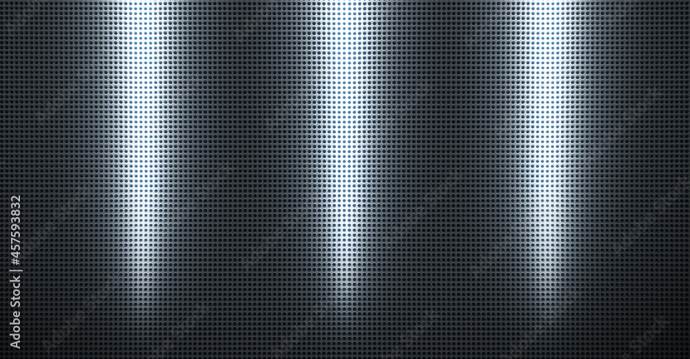 Spot lit perforated metal plate Spot lit perforated metal plate