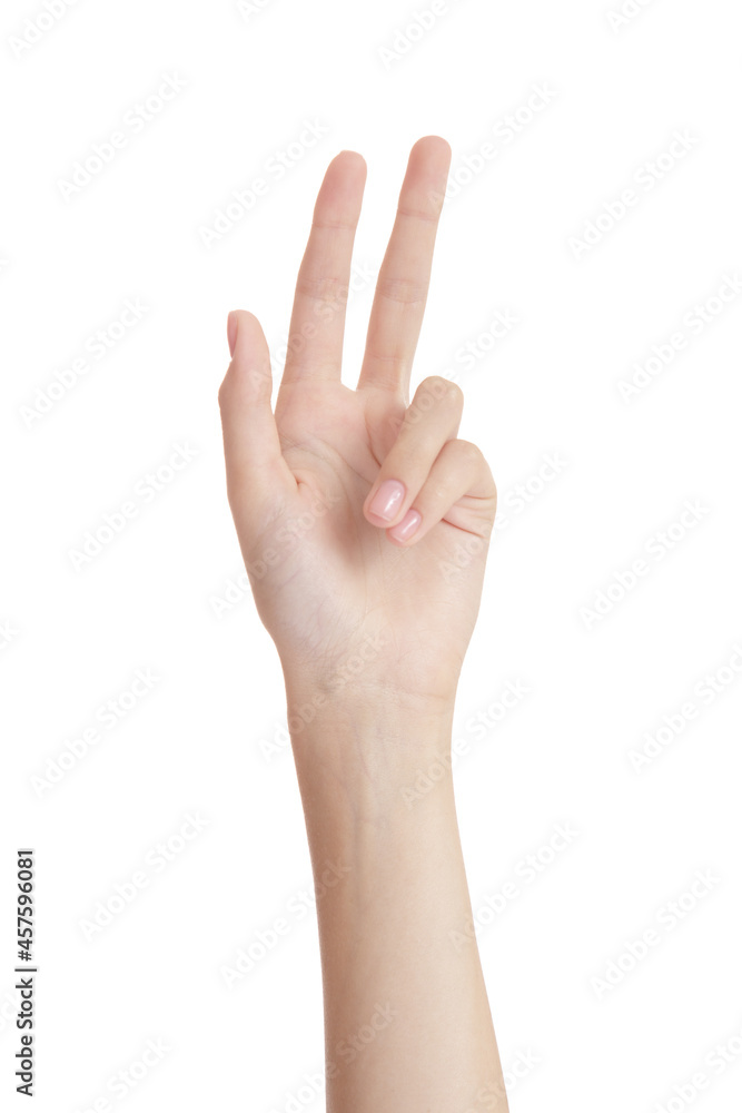 beautiful woman hand on a white background gesture of two fingers up. isolate beautiful woman hand on a white background gesture of two fingers up. isolate