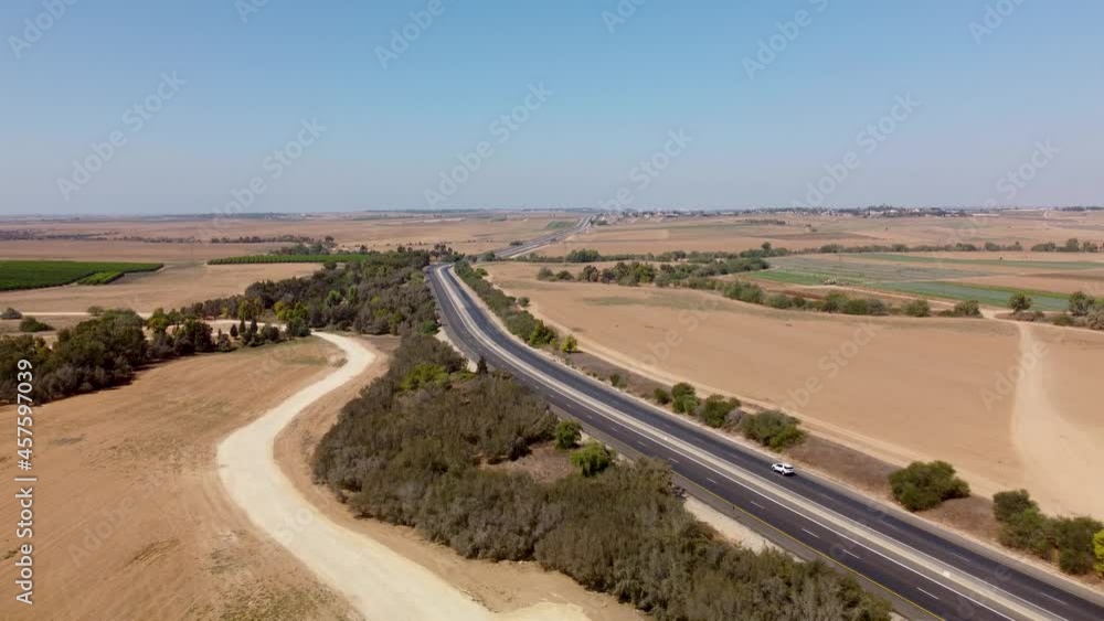 Flying backward in the sky over the highway in Southern Israel between Netivot and Sderot Flying backward in the sky over the highway in Southern Israel between Netivot and Sderot