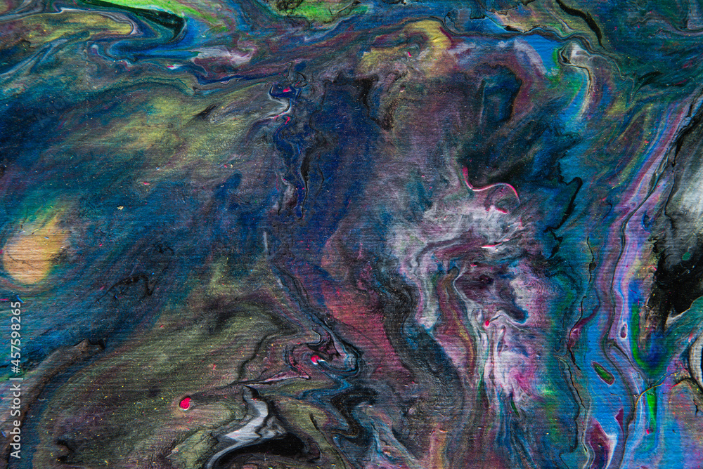 Fototapeta premium Texture in the style of fluid art. Abstract background with paint mixing effect. Liquid acrylic paint background. Blue, black, white and purple colors.