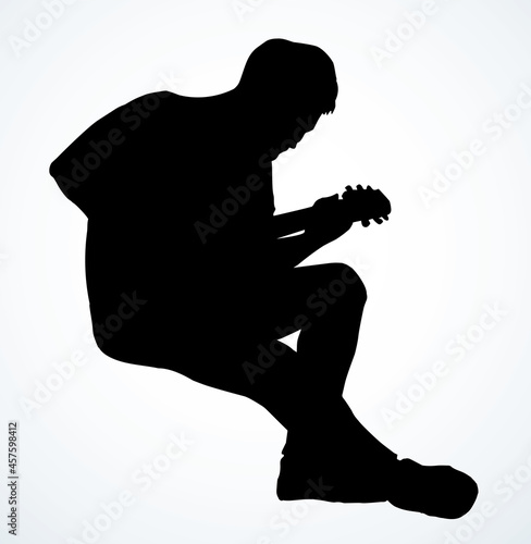 A man plays the guitar. Vector drawing