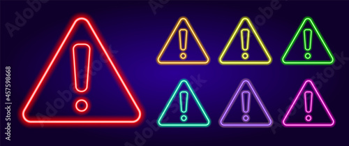neon exclamation mark in a triangle. A set of attention signs of different colors is an exclamation mark in a triangular shape . isolated multicolored collection of glowing bug icons