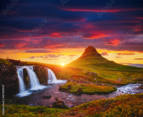 Fototapeta Naklejka Na Ścianę i Meble -  Fantastic view of Kirkjufellsfoss waterfall at sunset. Iceland, Europe.