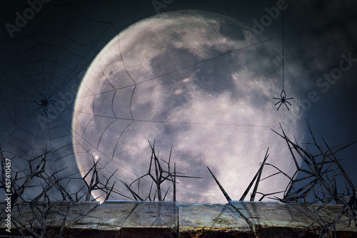 background for Halloween with moon and rustic boards photo