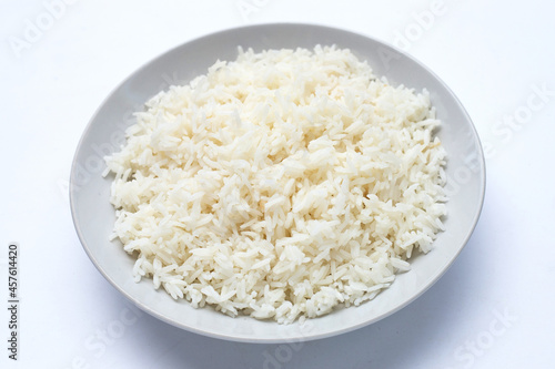 Dish of rice on white background.