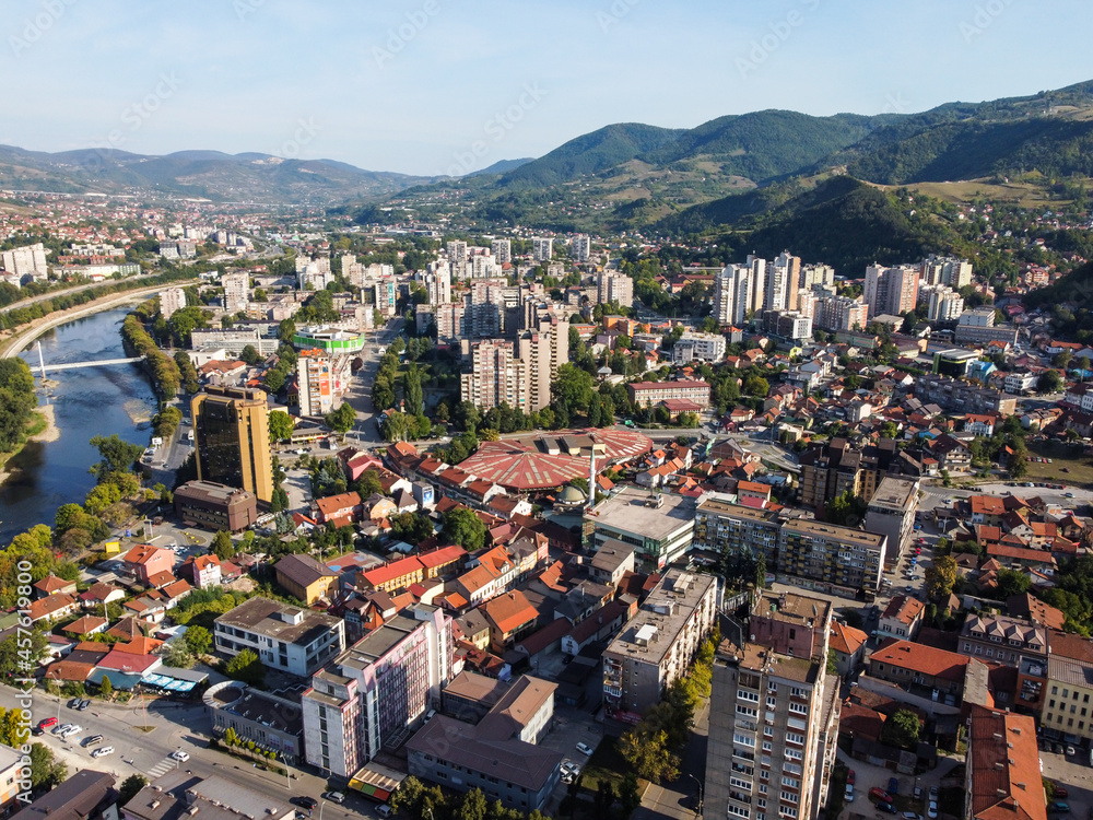 Fototapeta premium Aerial drone view of Zenica, Bosnia and Herzegovina. Buildings, streets, parks and residential houses. City center of Zenica, view from above. 