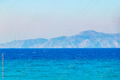 Kremasti beach Rhodes Greece turquoise water and Turkey view.