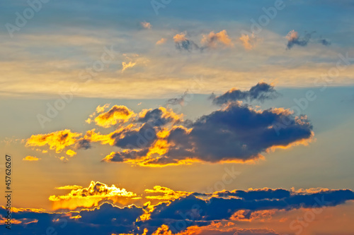 brightly contrasting cloudy sky at sunset © photosaint