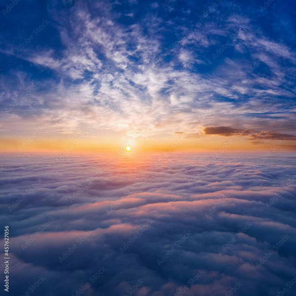 The sky above the clouds before dawn. Wonderful heavenly landscape.