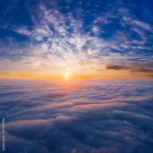 The sky above the clouds before dawn. Wonderful heavenly landscape.