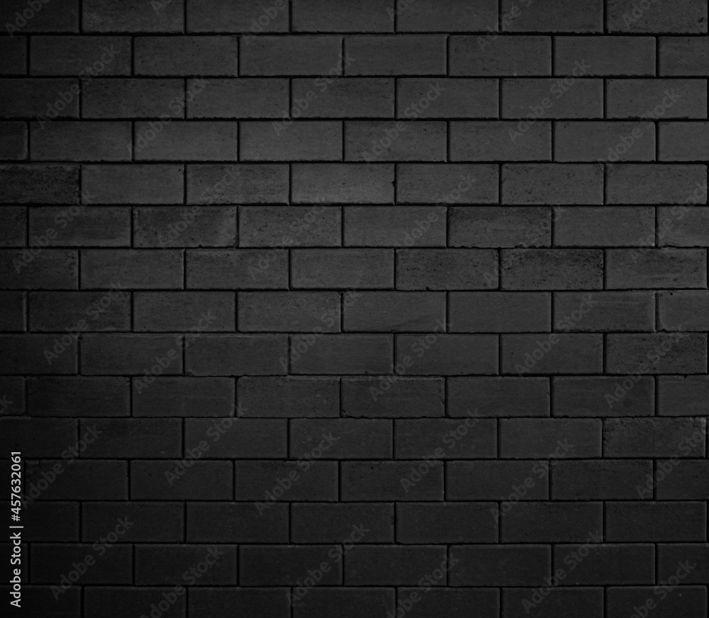 The black wall texture uses a lot of bricks. or black brick wall with abstract pattern.