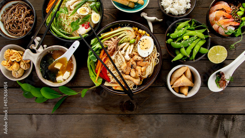 Photography Asian dishes and snacks on wooden background.
