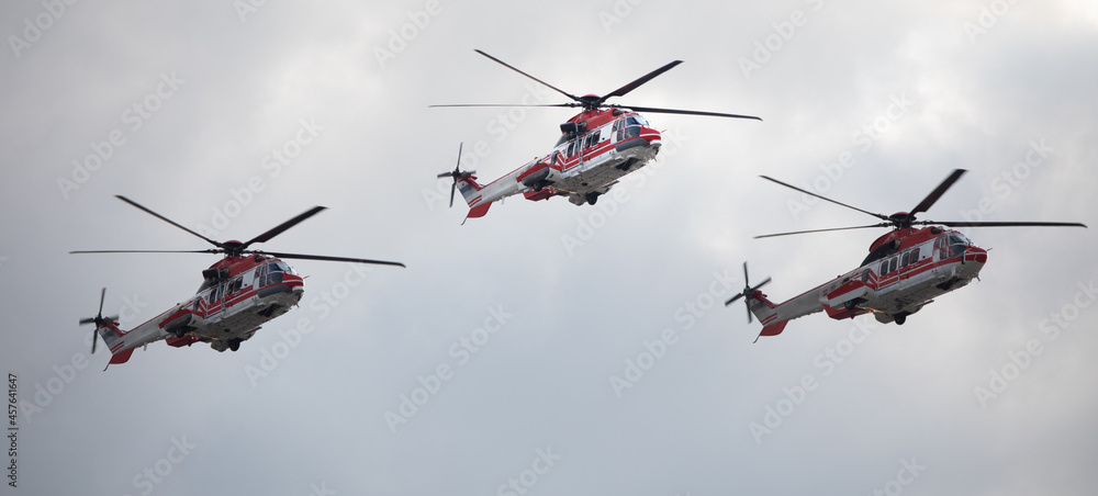 Fototapeta premium Ambulance, military or civilian helicopter on sky background.