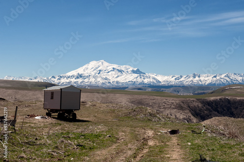 the trailer on wheels for builders near the Elbrus