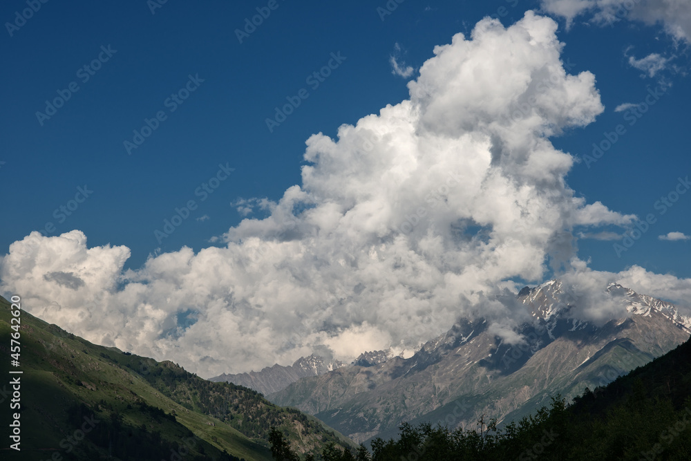 Clouds in the valley in the mountains.