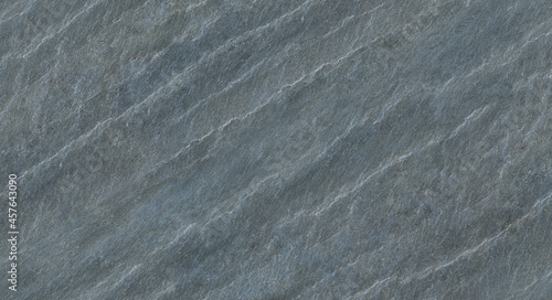 The texture of the stone wall. Close-up. Light gray rock backdrop.