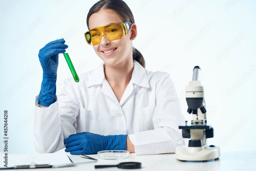 woman biologist laboratory research chemical solution microscope woman biologist laboratory research chemical solution microscope