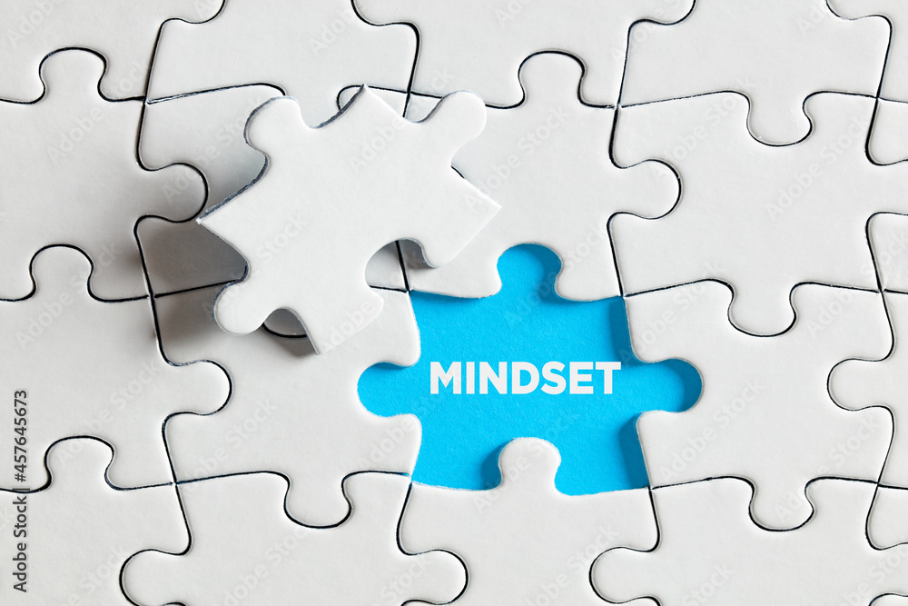 The word mindset on blue missing puzzle piece. To expose or discover mindset The word mindset on blue missing puzzle piece. To expose or discover mindset