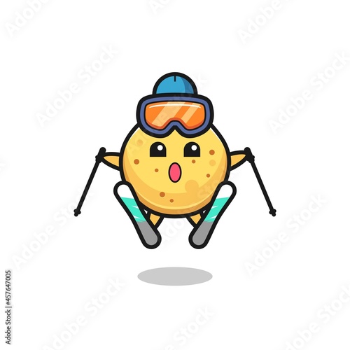potato chip mascot character as a ski player