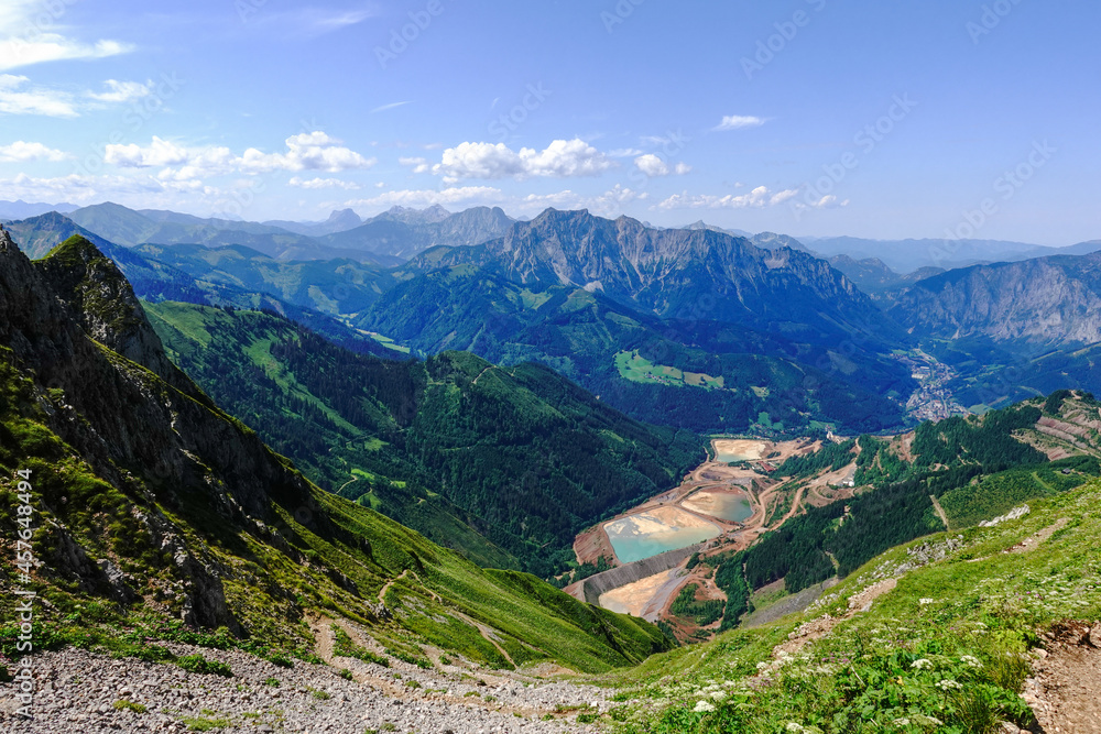 steep hiking path with view to blue ponds with sand from the ore mountain