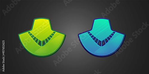 Green and blue Necklace on mannequin icon isolated on black background. Vector