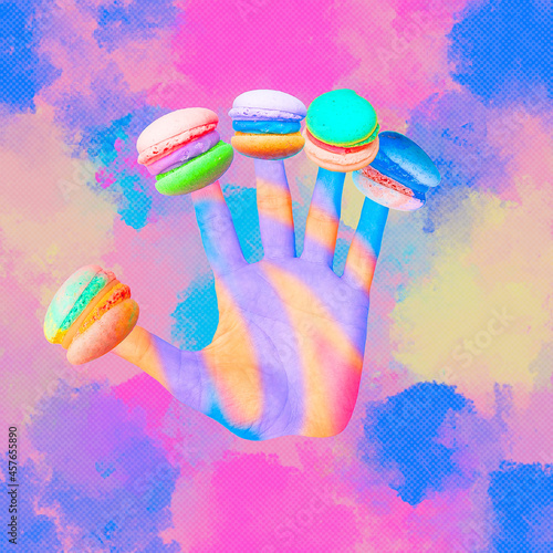 Contemporary minimal art collage Hand and macaroon in abstract vanilla space.  Calories, diet, sweet food concept photo