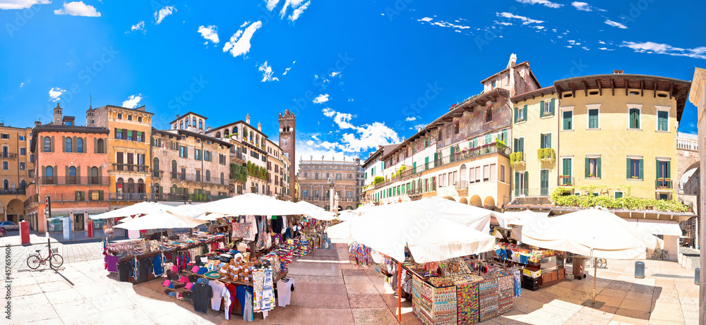 Piazza delle erbe in Verona street and market panoramic view