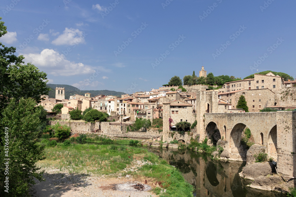 medieval bridge in the town of besalu in girona a sunny summer day