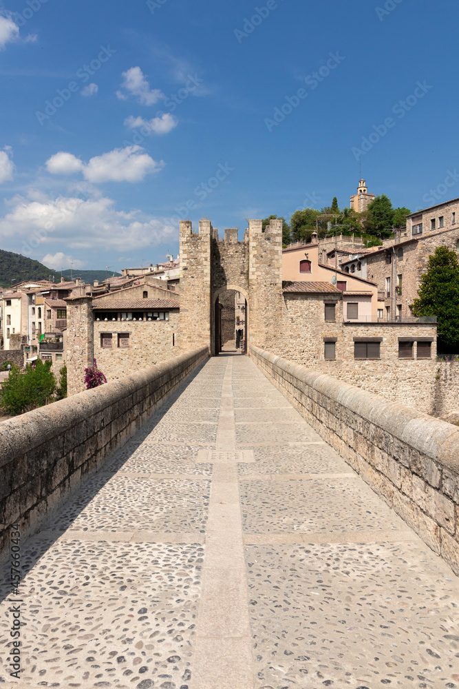 medieval bridge in the town of besalu in girona a sunny summer day