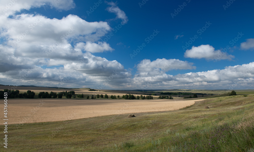 Landscape with clouds in hot summer