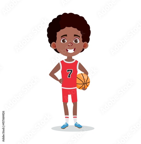 Black teen basketball player. Smiling boy standing with basketball ball