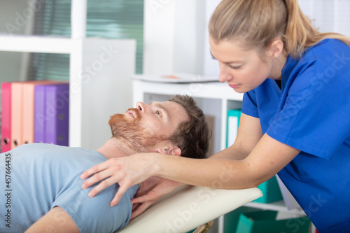 handsome man who receives chiropractic treatment